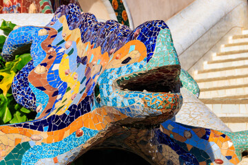 Multicolored mosaic dragon salamander of Gaudi in Park Guell, Barcelona, Spain