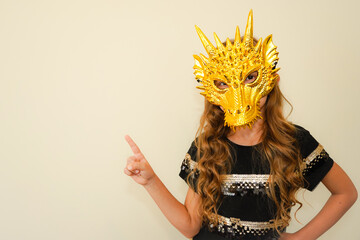 Dragon mask. Mask of golden dragon. 2024 year of the dragon. New Year celebration