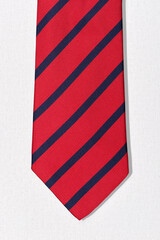 men's red tie with narrow blue stripes