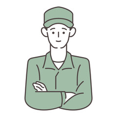 腕を組んでいる男性作業員