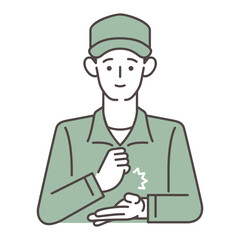 手を叩く男性作業員