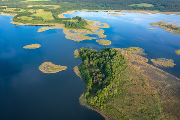 Aerial view of National park Braslav Lakes in sunny day. Panaramic view on beautiful blue lakes in autumn. Travel to Vitepbsk region.