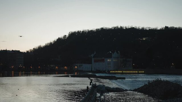 Prague's Museum Kampa viewed from Novotn&eacute;ho l&aacute;vka across the Vltava at dusk