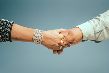 Multiracial couple holding hands together in love. Conceptual image of world unity interracial love...