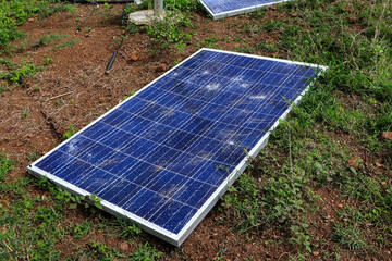 Broken destroyed cracked hole in solar panel or Broken destroyed cracked hole in solar panel after...