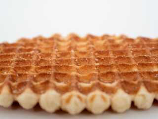 Belgian waffles isolated on white background. Belgian waffles close up.