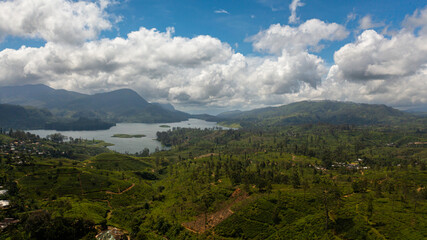 A lake in a mountainous area among tea plantations. Maskeliya, Castlereigh, Sri Lanka.