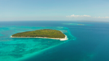 Obraz premium Tropical landscape: small island with beautiful beach, palm trees by turquoise water view from above. Patongong Island with sandy beach. Summer and travel vacation concept.