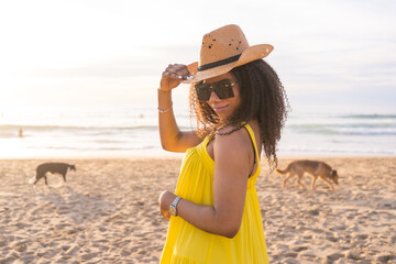 Attractive young woman spending some time at the beach