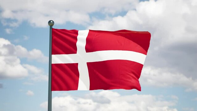 Danish flag flutters in the wind. Denmark national flag of european country. Cloudy sky background.