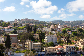 Fototapeta na wymiar Algiers, Alger, Algeria : Panoramic view of the northern districts. Houses, mosque, green hill.