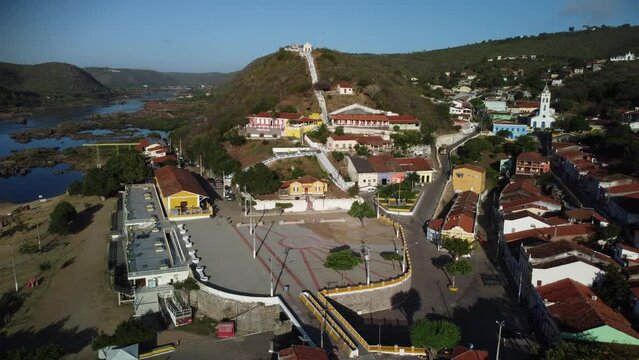 Aerial footage of Piranhas municipality along Sao Francisco River on a sunny day in Alagoas, Brazil