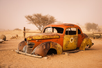 Abandoned car at the service station of Solitaire in Komas region, Namibia. The station, located...