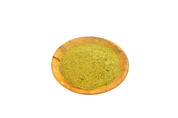 Moringa powder in a wooden bowl 