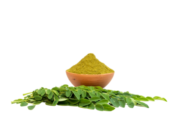 Moringa leaves and powder in a clay bowl