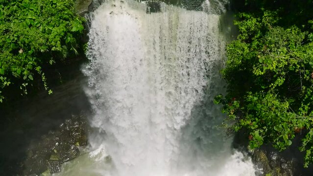 Waterfalls and lush foliage in Lake Sebu. Hikong Alo Falls Mindanao, Philippines. Slow motion.
