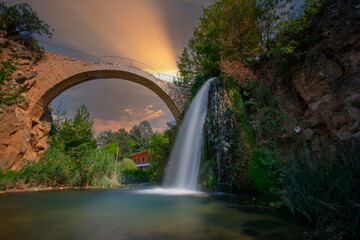 Clandras Bridge and Clandras Waterfall. Historical bridge from the Phrygian period in the district of Karahallı in Usak province. It is a touristic historical bridge.