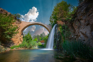 Clandras Bridge and Clandras Waterfall. Historical bridge from the Phrygian period in the district of Karahallı in Usak province. It is a touristic historical bridge.