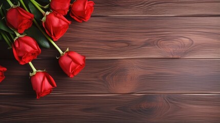 Naklejka na ściany i meble Bouquet of red roses on wooden background. Birthday. Valentine's day. March 8. Mother's day. Greeting card. Wallpaper. Banner. Flat lay, top view, copy space