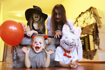 happy laughing child girl in costume to halloween