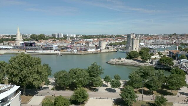 Saint Nicolas tower and Lantern tower, La Rochelle port, Charente Maritime in France. Aerial sideways