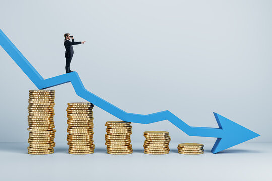 Businessman with telescope standing on abstract falling golden coins chart with blue downward arrow in light interior. Financial loss forecast and failure concept.
