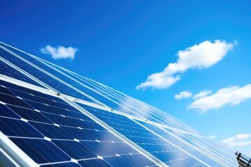 closeup of solar panels with clear blue sky in background