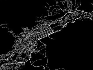 Vector road map of the city of  Ushuaia in Argentina with white roads on a black background.