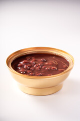 Bowl of sweet and fresh red bean paste on white background, Cantonese style dessert