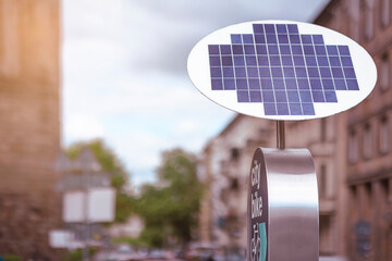 Solar Panel for Charging e Bike on City Street. Public Charging Station Solar Battery for Electric...