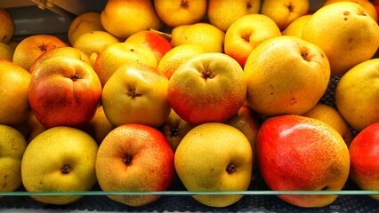 Delicious apples on retail display at supermarket