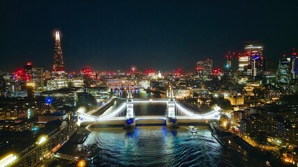 View the Tower Bridge at night in London