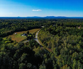 Aerial view of Pilot Mountain, Saurtown Mountains, and Hanging Rock creating a beautiful landscape