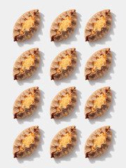Karelian pies pattern on white background © gudzar