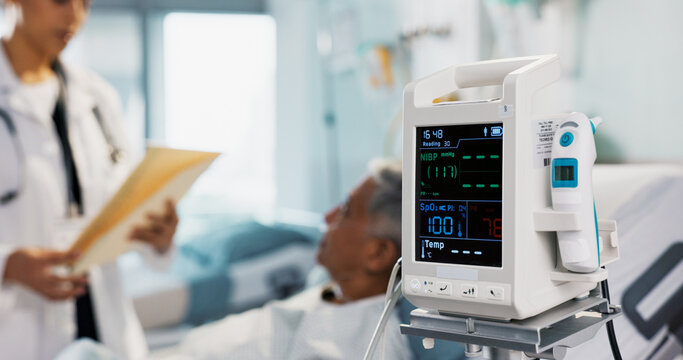 Patient, Doctor And Heart Monitor, Health And Help With Advice, Vital Sign Or Numbers With Rehabilitation In Hospital. People With Healthcare, Screen And Medical Emergency, Cardiology And EKG Machine