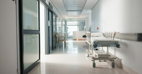 Healthcare, hospital and empty hallway with bed for medical care, health insurance and help in...