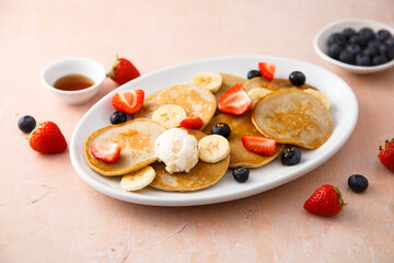 Homemade pancakes with banana and berries