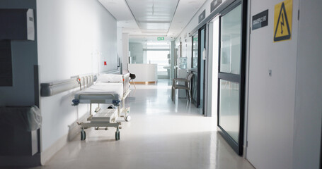Healthcare, hospital and empty hallway with bed for medical care, health insurance and help in...