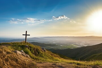 cross on a hill overlooking a valley - obrazy, fototapety, plakaty