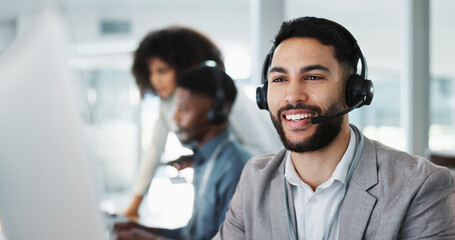 Happy businessman, call center and customer service in telemarketing, communication or support at office. Friendly man, consultant or agent smile in online advice, help or contact us at workplace