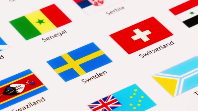 Zoom out of flags of several countries in the world with the letter S before it. illustrative video.