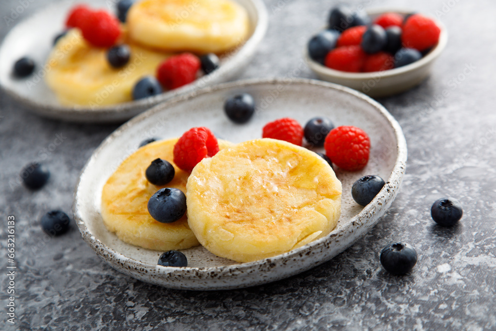 Wall mural cottage cheese cakes with fresh berries