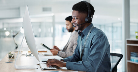 Happy black man, call center and customer service in telemarketing, communication or support at...