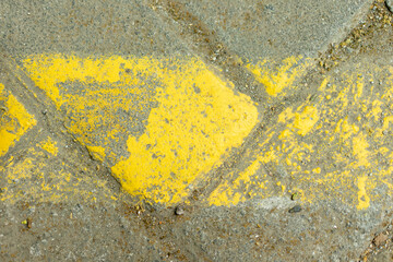paving blocks. detail of yellow paving blocks that are starting to fade.