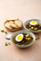 Traditional nettle soup with hard boiled egg