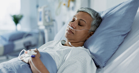 Sick, iv drip and senior woman in the hospital for consultation, surgery or treatment. Healthcare,...