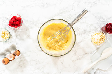 Whisking Delight - Bundt Cake Batter Preparation Begins