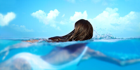 Woman, nature and ocean swimming for travel, holiday and sea water on a tropical island. Hawaii,...