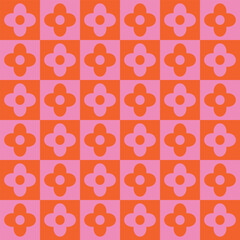 Cute retro flowers seamless pattern on pink and orange checkerboards. For textile , home décor and stationary