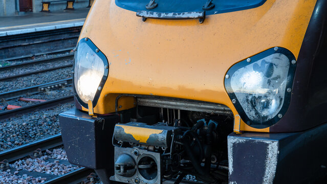 The front of a yellow diesel locomotive in the UK